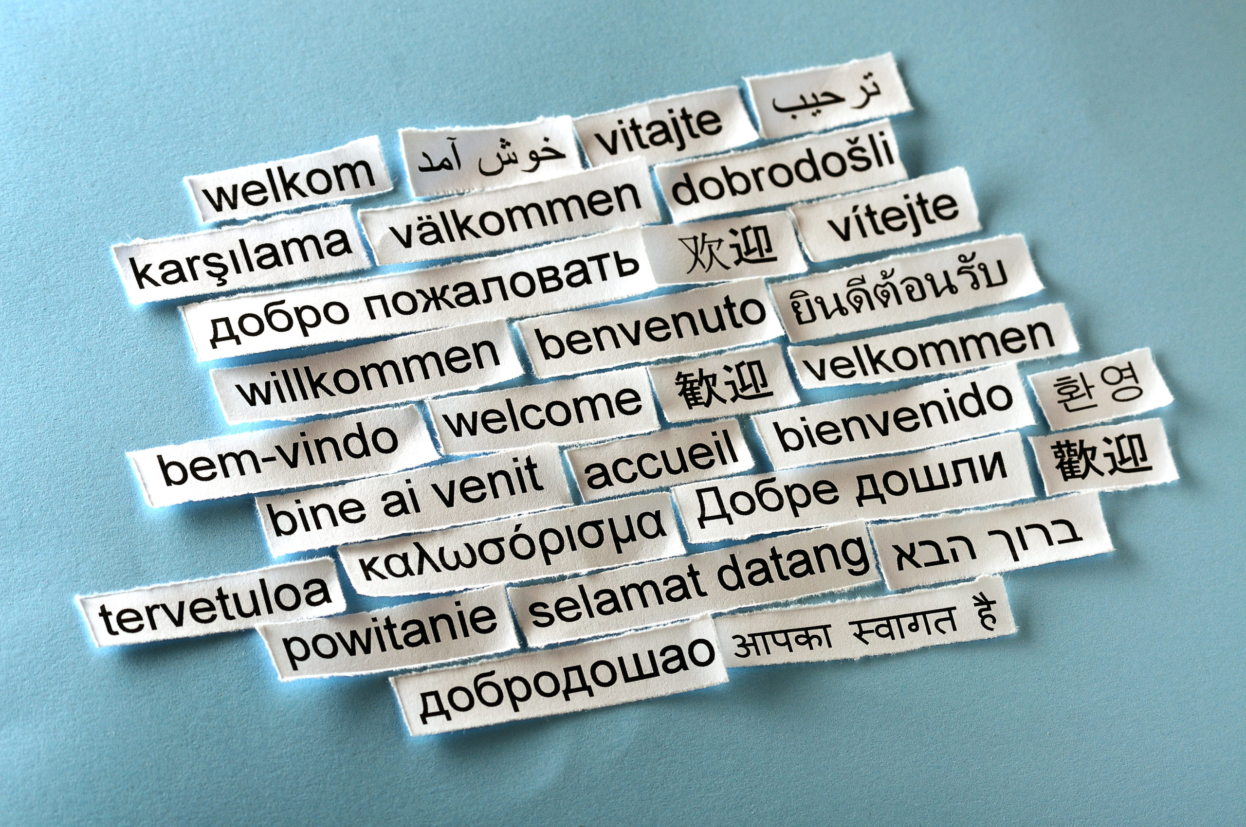 様々な言語で表示された「ようこそ」のイメージ